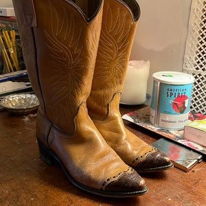 Worn, vintage women’s acme Cowboy Boots.